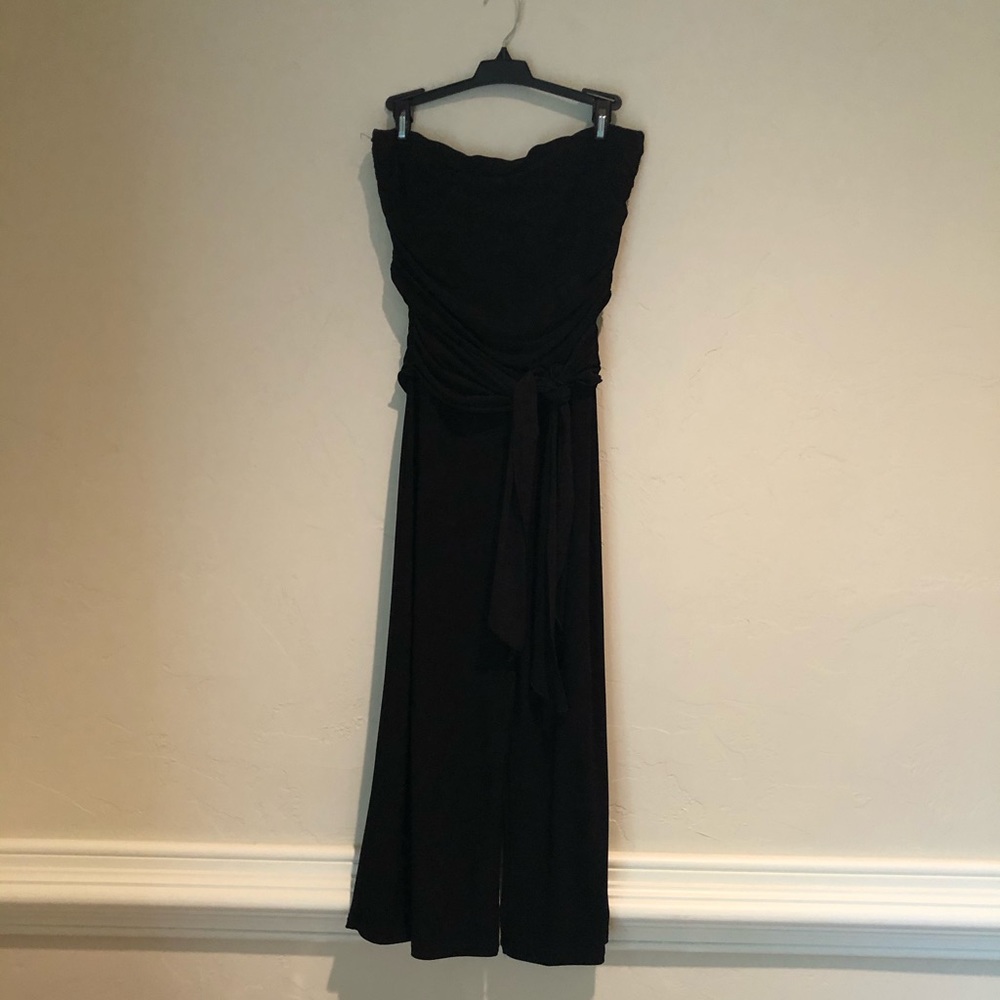 Black sleeveless jumpsuit with waist tie